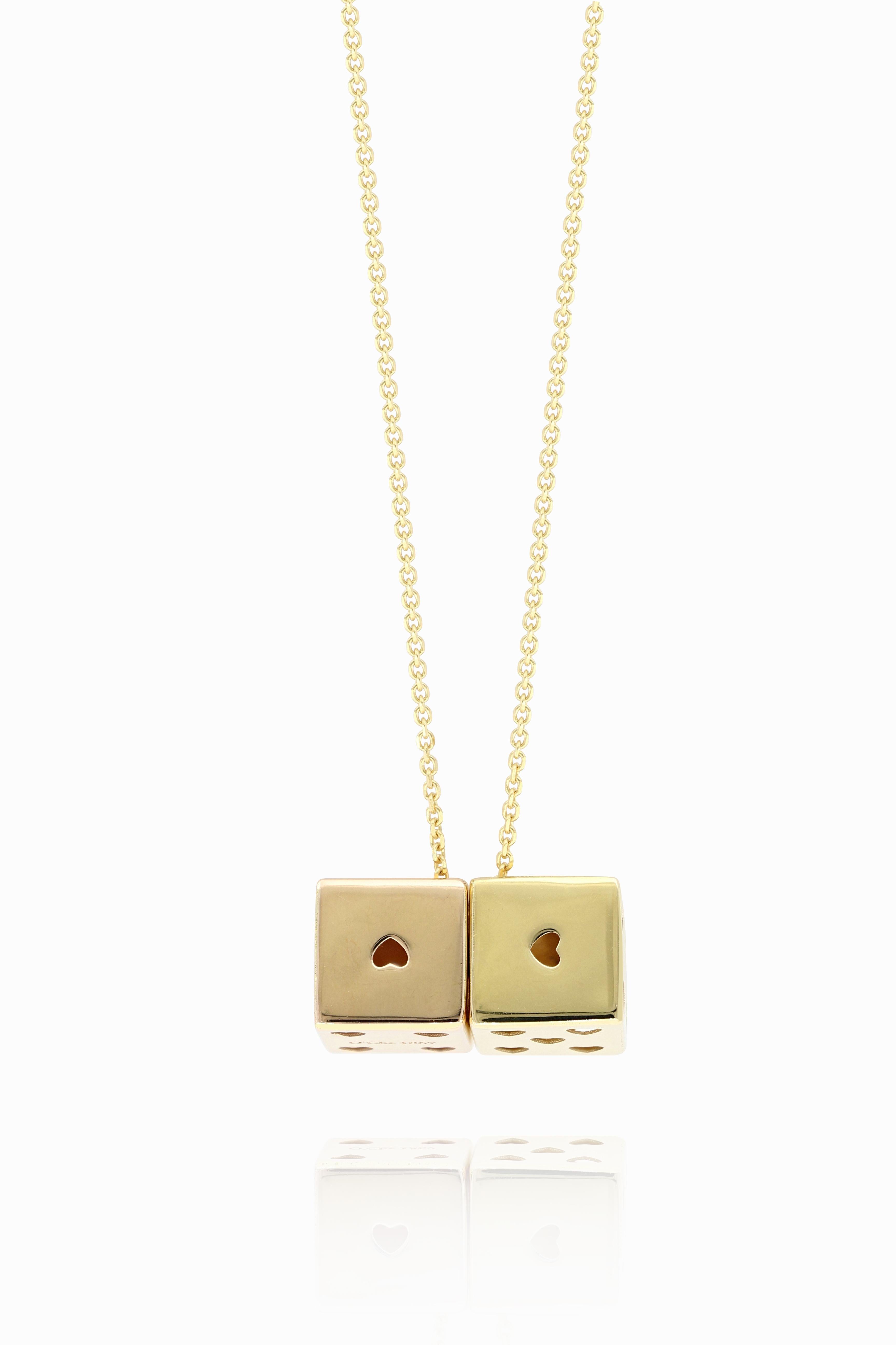This unique 18K gold pendant necklace, designed and made in Italy,  is in the form of two dice cubes in yellow gold and rose gold. It is very trandy and stylish, can be matched with jeans and everyday wear.

The company was founded one and a half