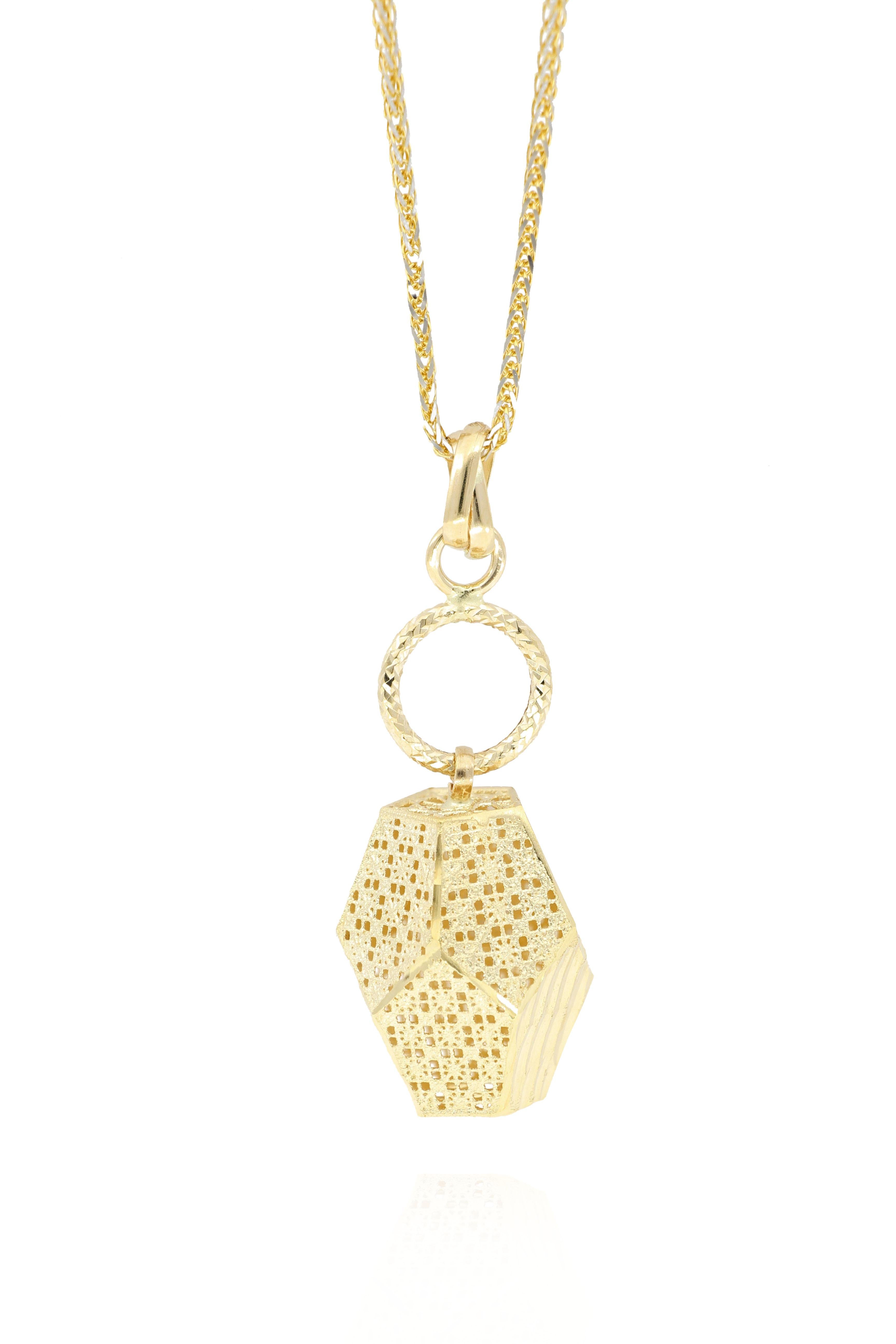 This beutiful pendant necklace, designed and made in Italy,  is a three-dimensional dodecahedron, with floral carvings on the surface in 18K yellow gold.
The company was founded one and a half centuries ago in Macau. The brand is renowned for its