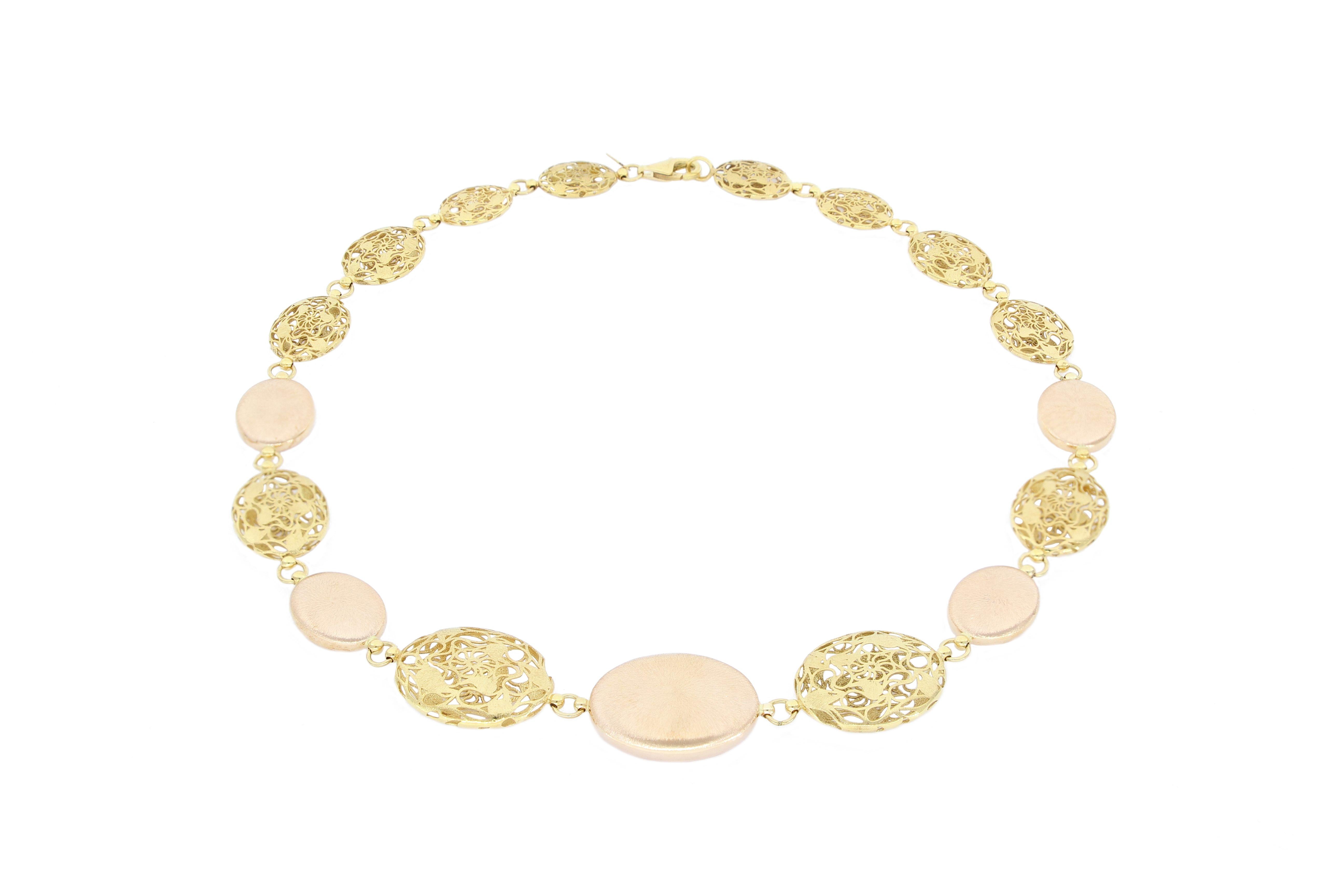 This fabulous 18K Gold Necklace is designed and made in Italy, this special piece of jewellery is composed of yellow gold and brushed rose gold, with superb craftsmanship, perfect accessory for modern and sophisticated women.

The company is
