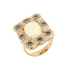 Anillo italiano de oro rosa con diamantes y ópalo azul de Londres de 18 quilates para ella