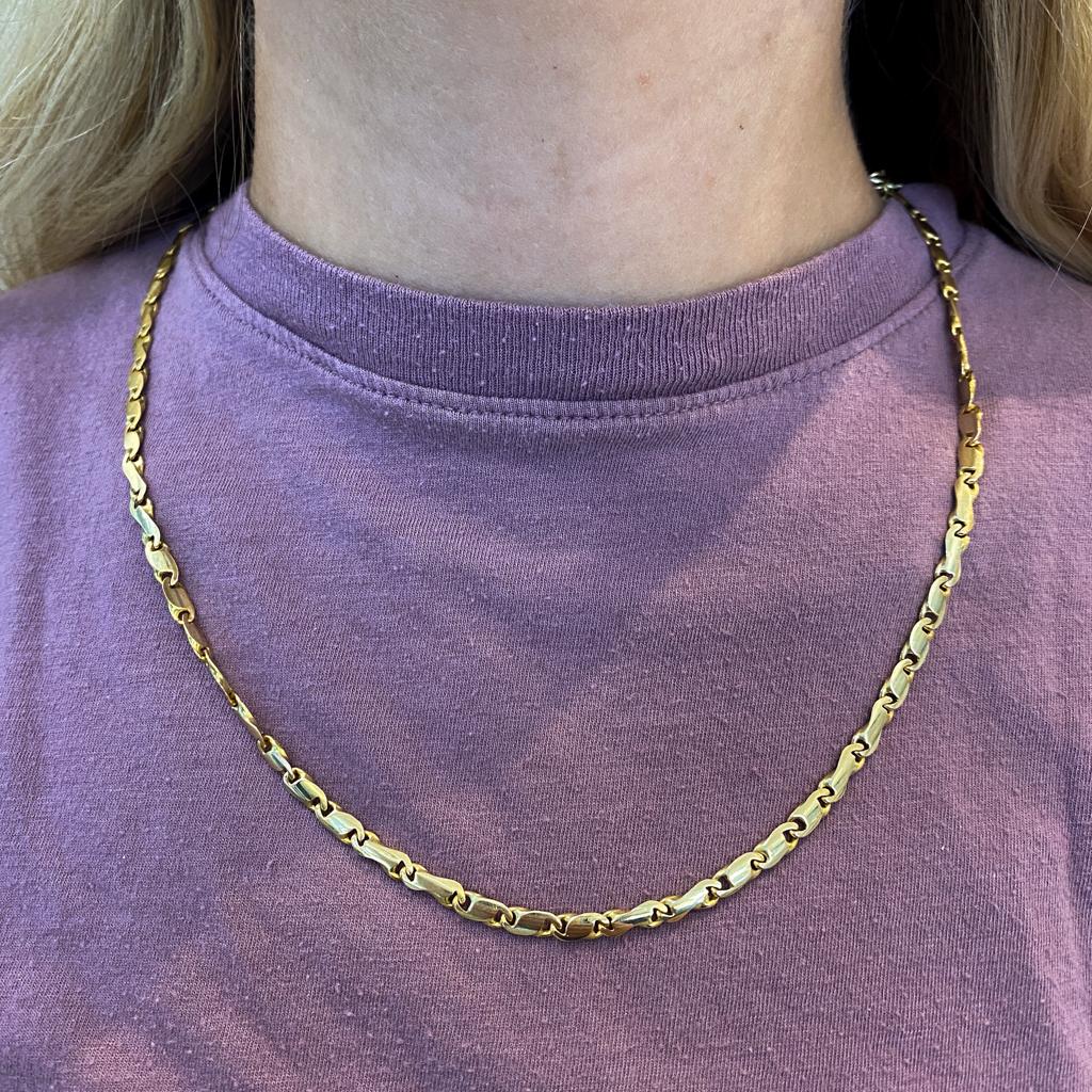 Finely crafted and finely finished, this chain was made in Italy. This substantial necklace looks wonderful on any neck, worn alone or stacked with multiple chains for a layered look. The design is versatile and looks fantastic on anyone! With a