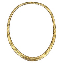Collana a collare Tubogas in oro bicolore 18 carati di Masella, anni 
70