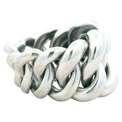 Anello scultoreo a maglie intrecciate in oro bianco 18 carati, distretto orafo di Alessandria