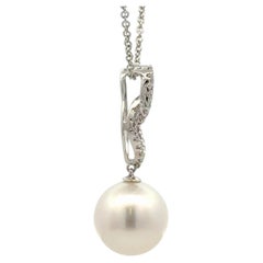 Collier italien en or blanc 18K avec pendentif perle des mers du sud et diamant 0.25 Cts 12mm