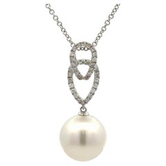 Collier italien en or blanc 18K avec pendentif perle des mers du sud et diamant 0.25 Cts 12mm