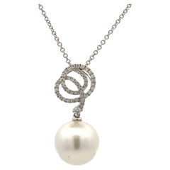 Collier italien en or blanc 18K avec pendentif perle des mers du sud et diamant 0.28 cts 12.5mm