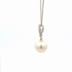 Collier italien en or blanc 18K avec pendentif perle des mers du sud et diamant 0.41 cts 11-12mm