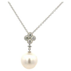 Collier italien en or blanc 18K avec pendentif perle des mers du sud et diamant 0.41 cts 11-12mm