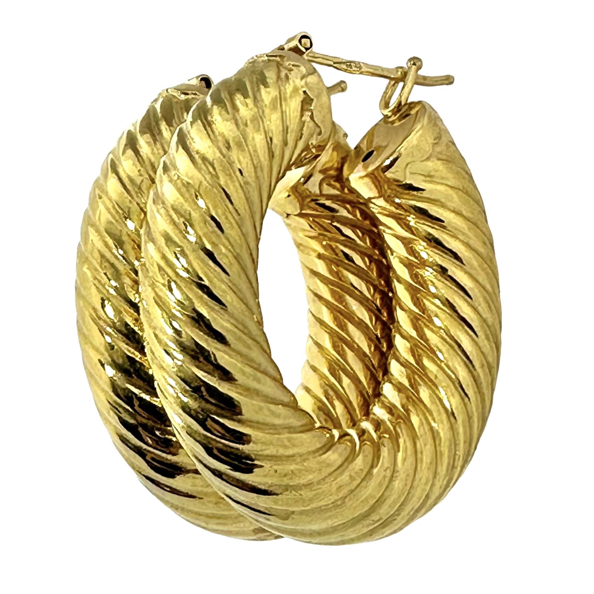 Modern Italian 18K Yellow Gold Twisted Hoop Earrings 1.25 Inches Long x 1/4 Inch Thick For Sale