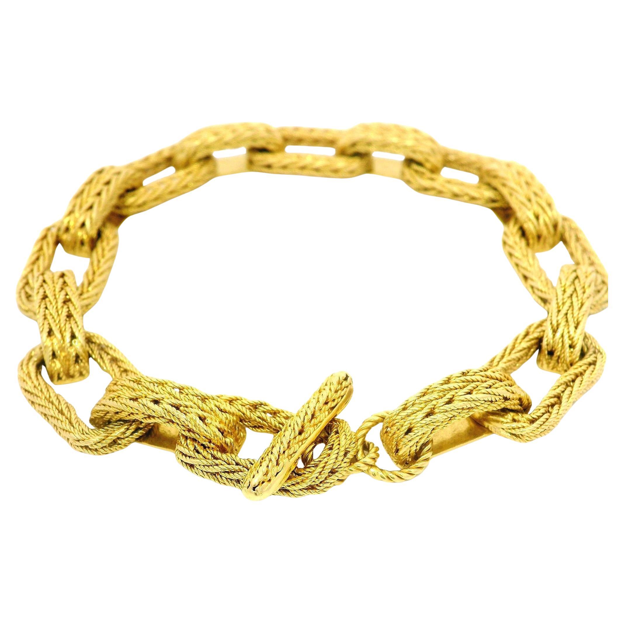 Bracelet italien en or jaune 18k à maillons rectangulaires tressés avec fermoir à bascule