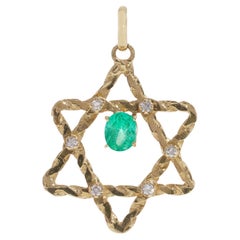 Italian 18kt. gold star of David pendant set with emerald and diamonds