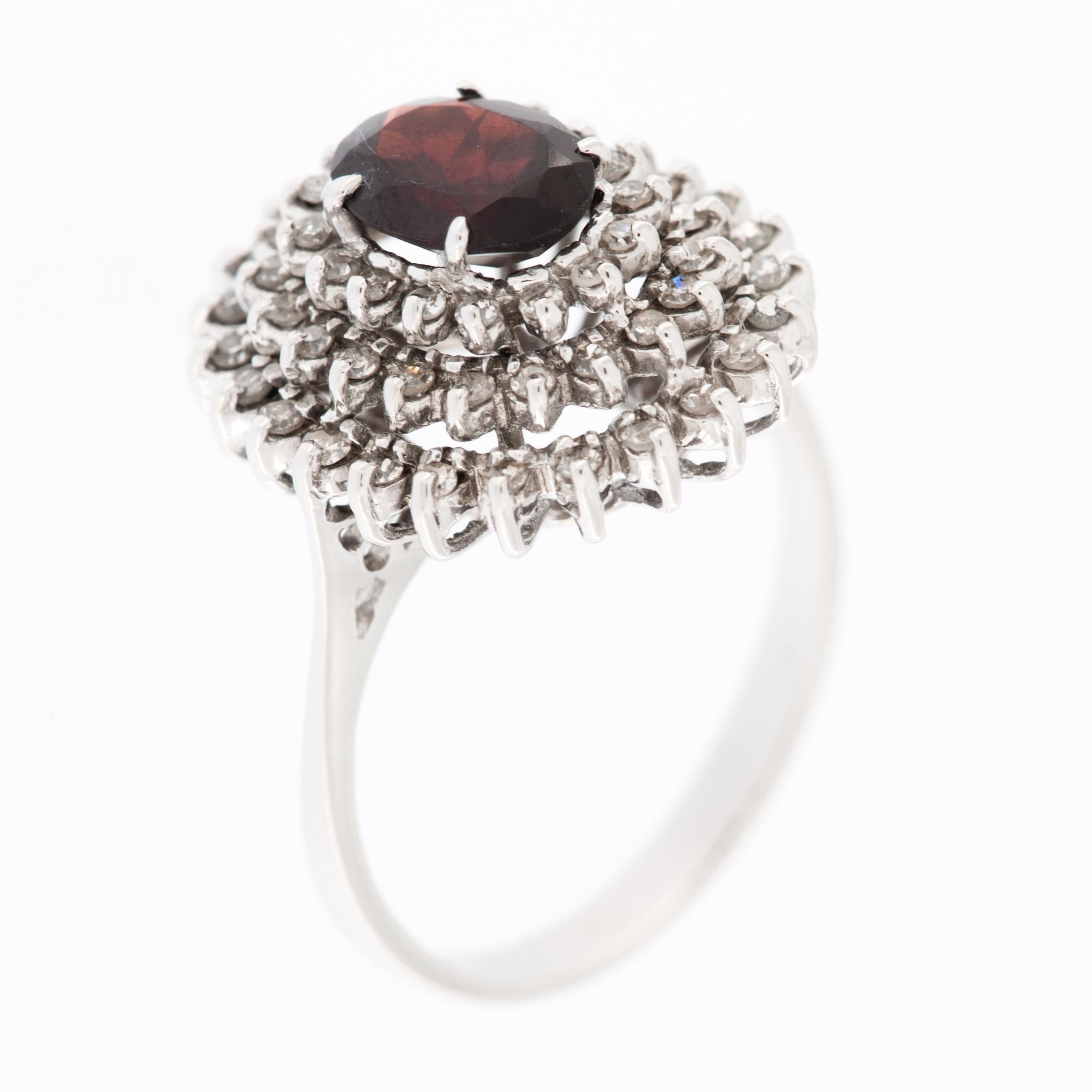 Modern Italian 18 karat White Gold Cocktail Ring with Diamonds and Garnet For Sale