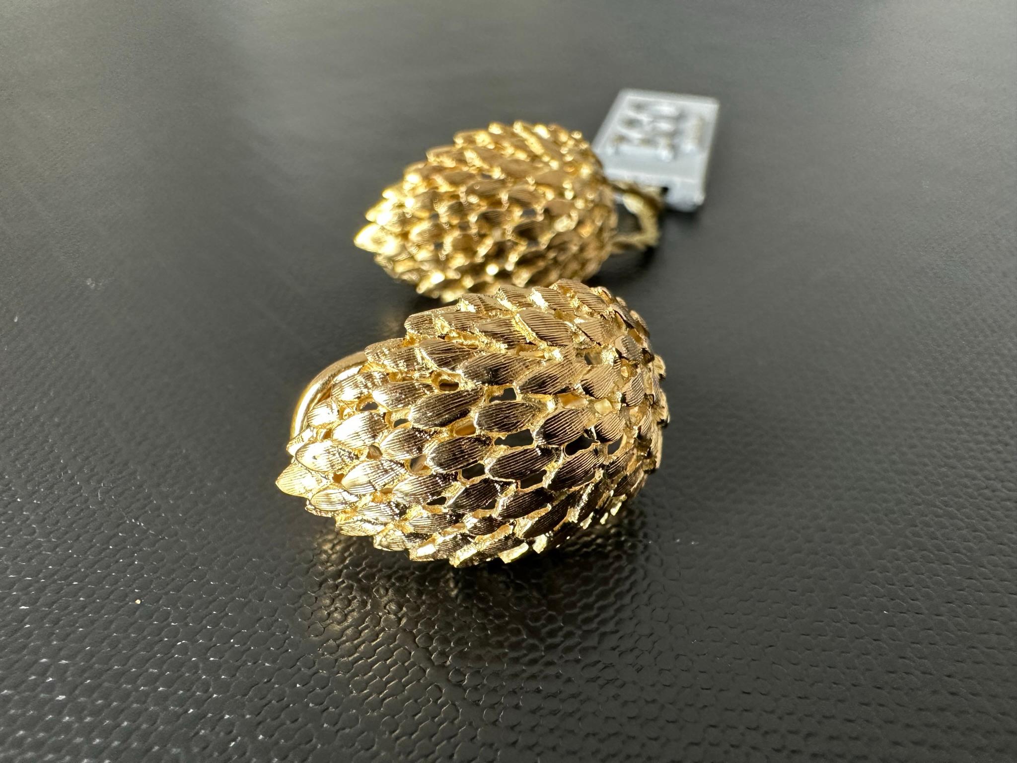 Boucles d'oreilles italiennes en or jaune 18kt en forme de plumes Unisexe en vente
