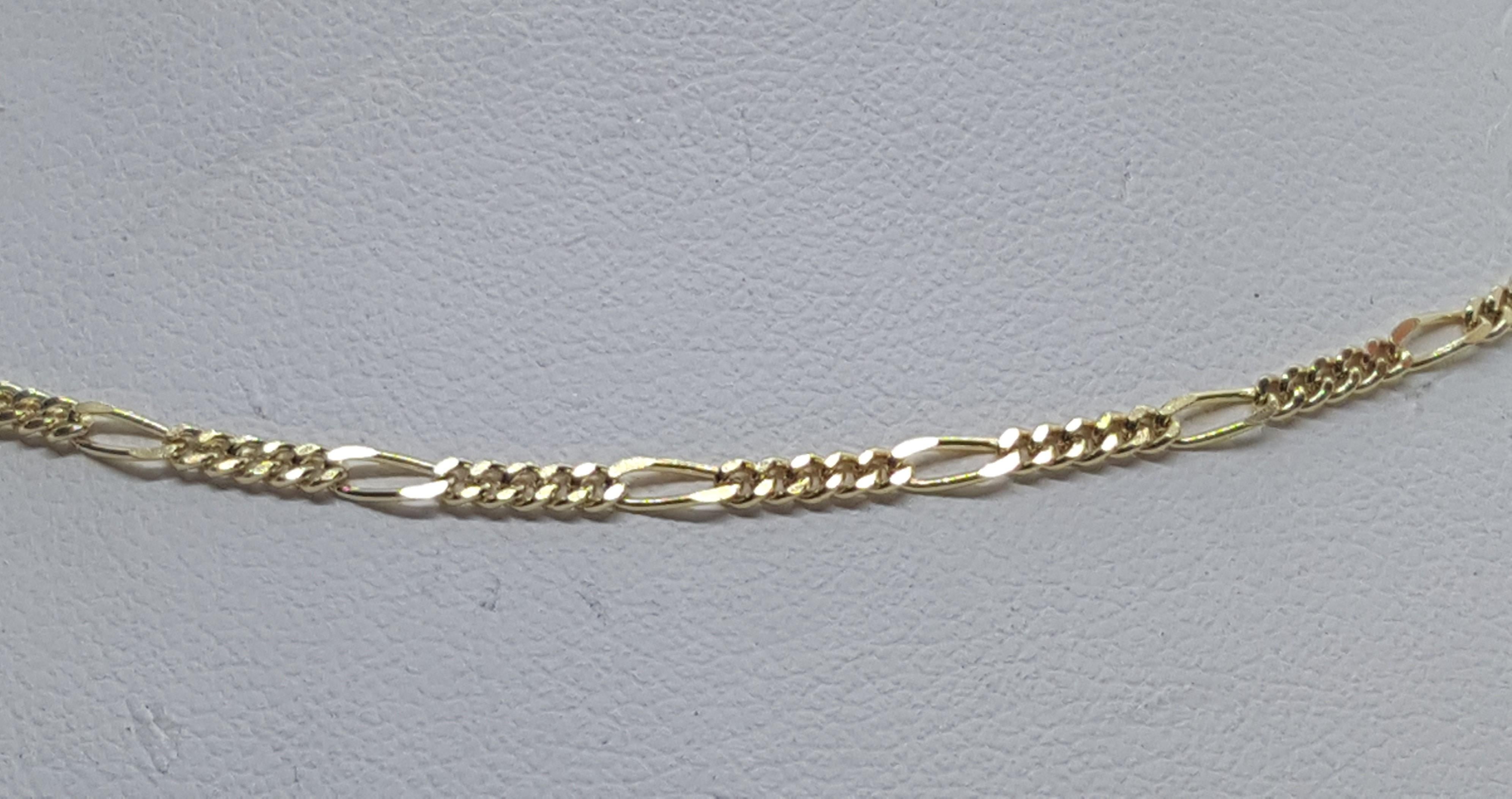25-inch 18kt yellow gold Figaro chain that is 2mm wide, made in Italy, stamped Italy 750, 6.7 grams with a spring-ring clasp.  This chain is in very good condition. Please let us know if you have any questions. 

Rock N Gold Creations has been in