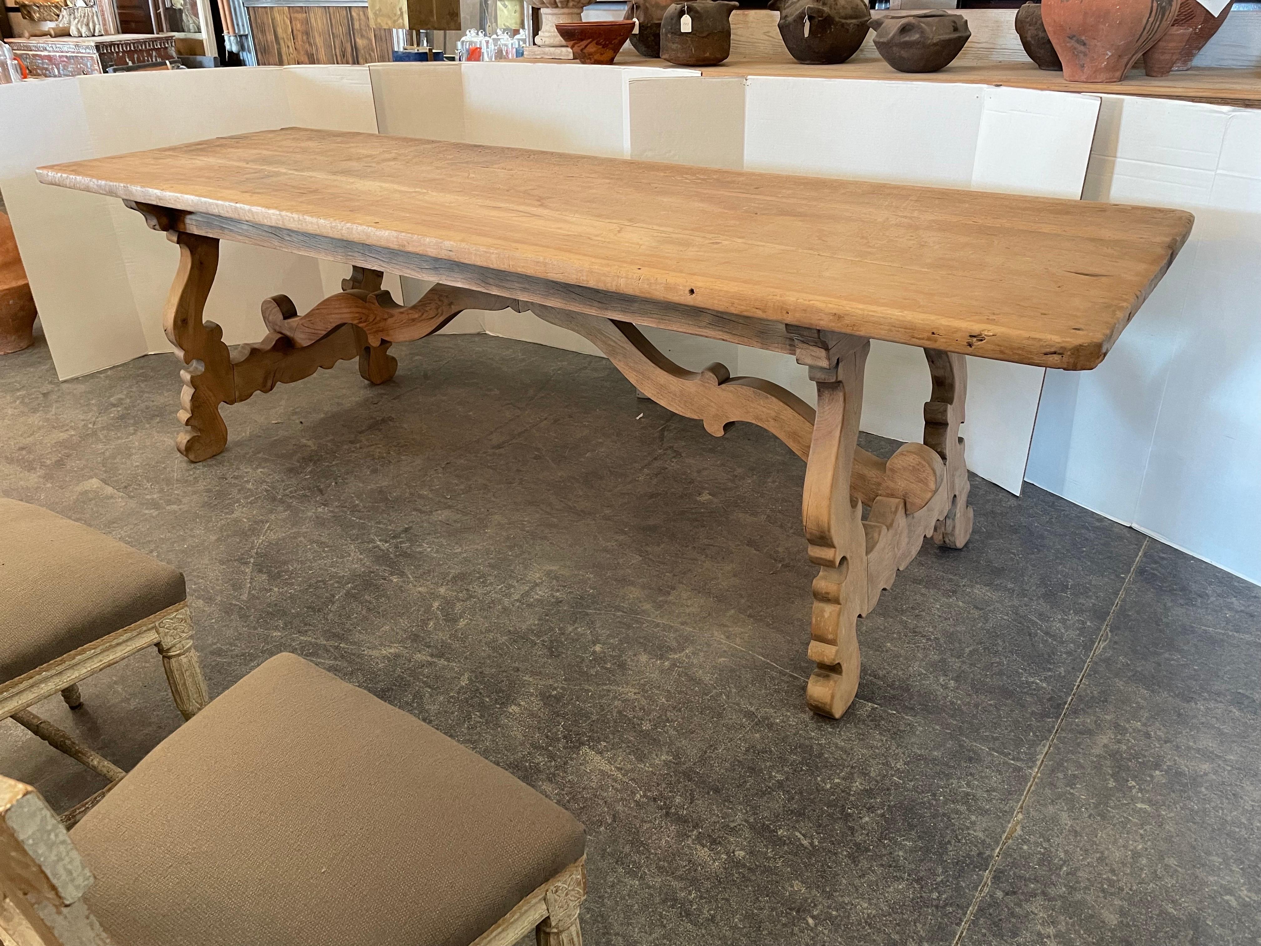 This Italian walnut table originally from Tuscany was made with an 18th century top and 19th century base. The top has the beautiful worn patina consistent with a table of that age. It looks to have bleached as it’s a lighter walnut. It measures