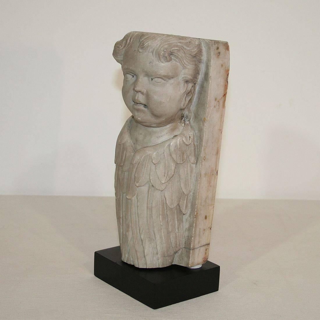 Beautiful weathered baroque marble angel fragment, Italy, circa 1700-1750. Weathered.