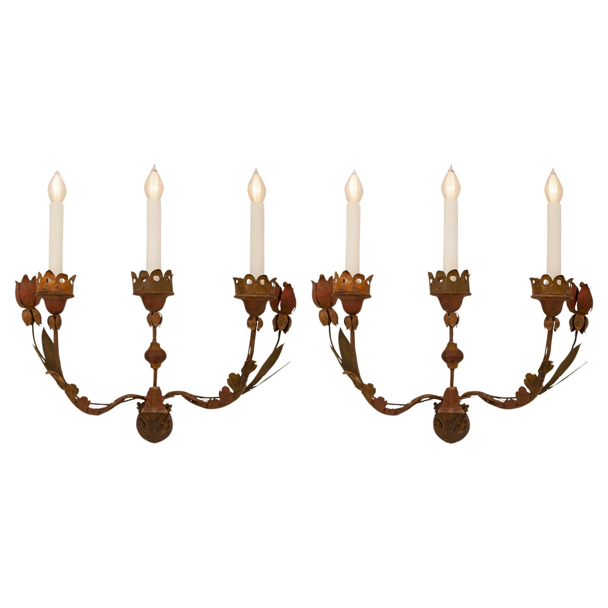 Italian 18th century Baroque Period patinated metal and wood sconces