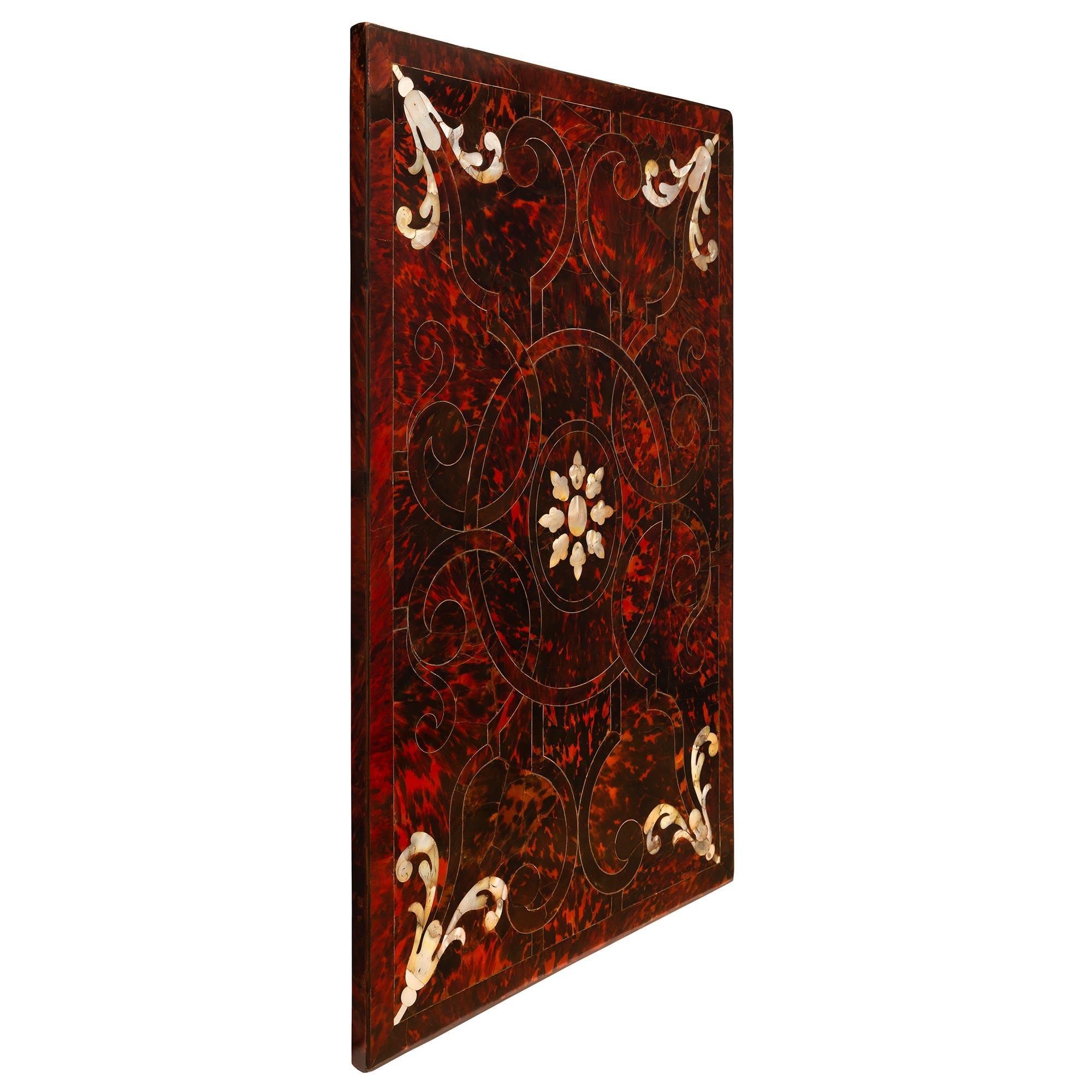 A stunning and very unique Italian 18th century Baroque st. Tortoiseshell and Mother of Pearl wall decor plaque. The extremely decorative rectangular plaque displays a stunning and most decorative red Tortoiseshell background with wonderfully