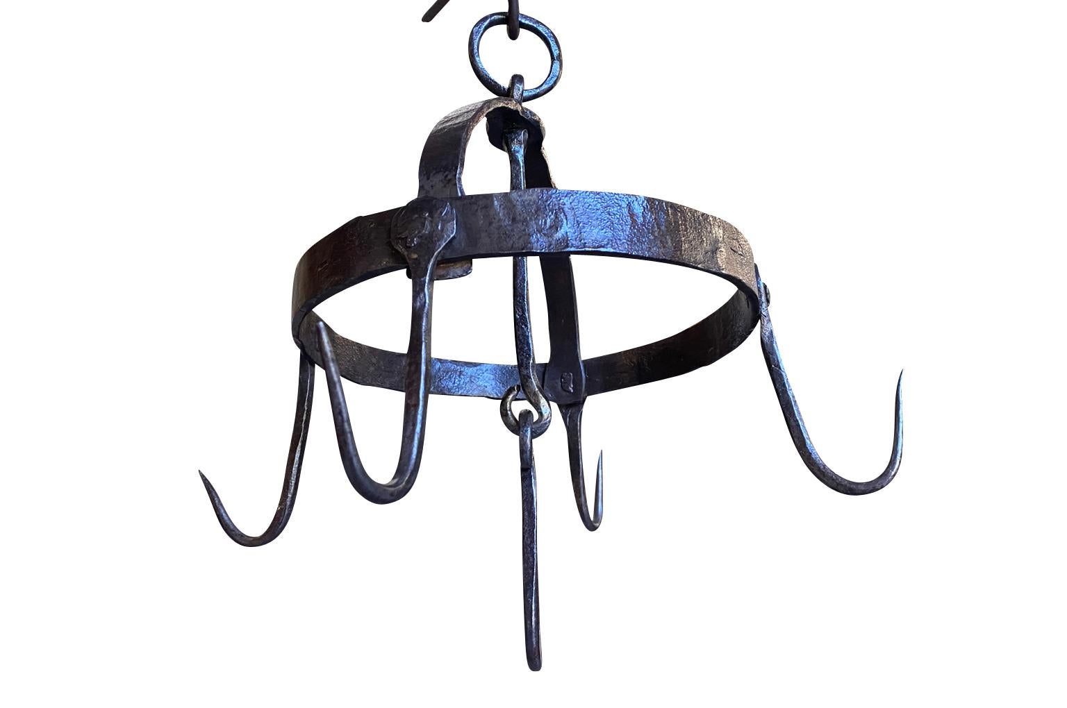 Charming 18th century Butcher Hooks from the Piedmont region of Italy. Wonderfully crafted from hand forged iron. A perfect kitchen accessory or to suspend hanging plants from. 