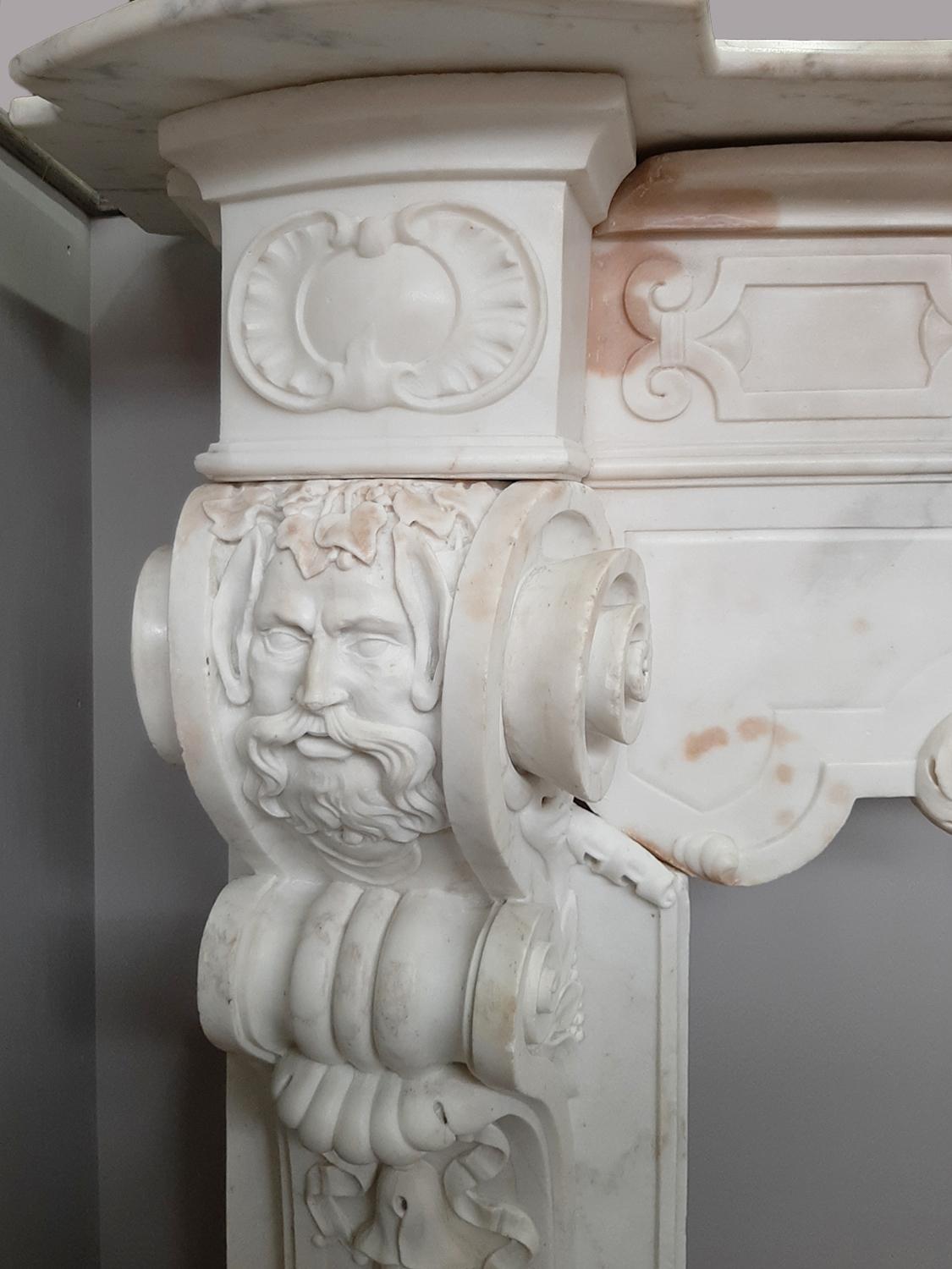 Italian 18th Century Carrara Marble Fireplace Richly Decorated Baroque Style In Good Condition For Sale In Baambrugge, NL