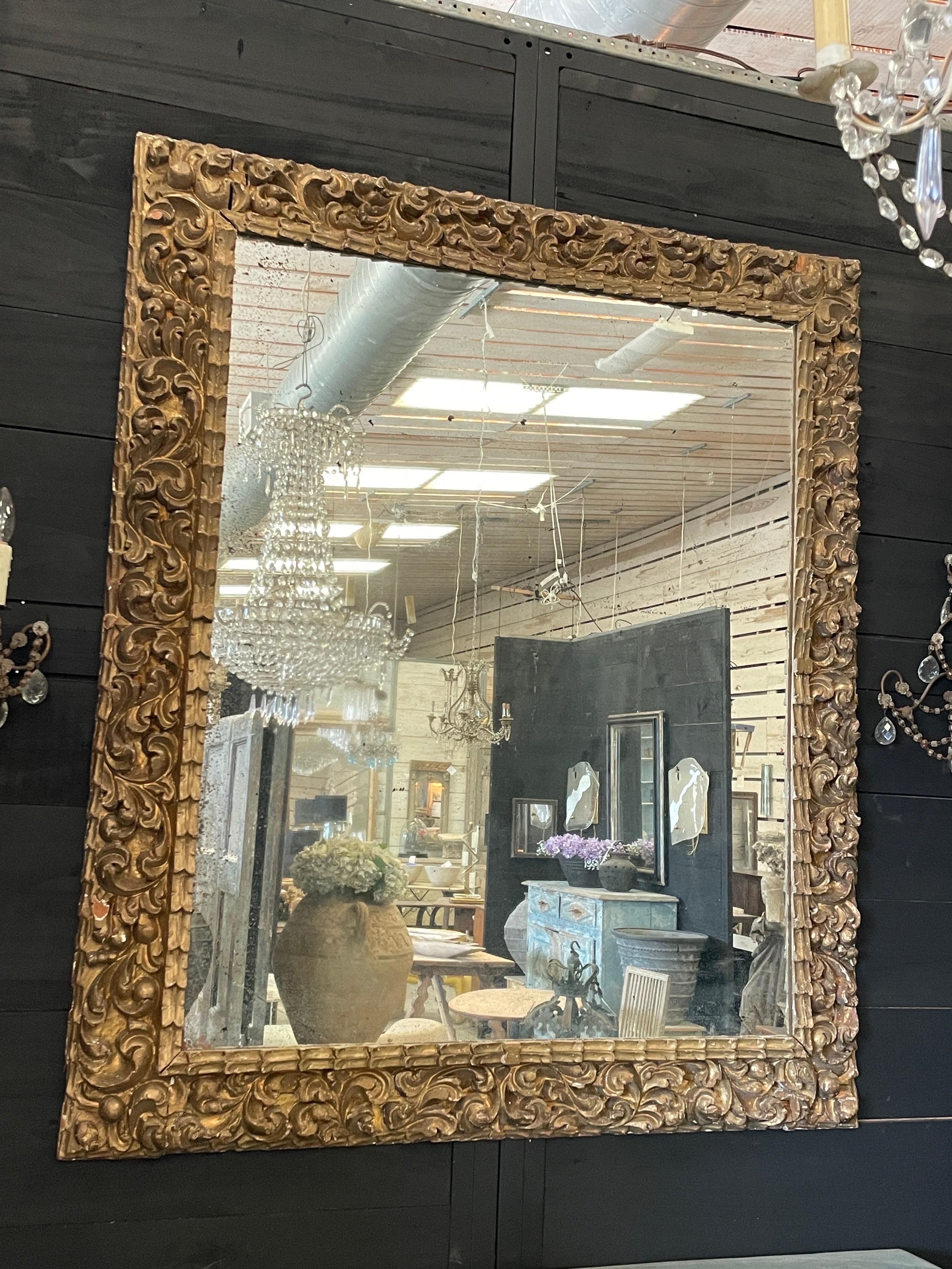 This lovely Mirror Frames is  from the 1700s Italy and replaced 19th century mirror is so charming. It has a few missing pieces but not anything that takes away from its beauty. In fact it adds to the antiquity of it. 
It’s a nice size at 49” w x
