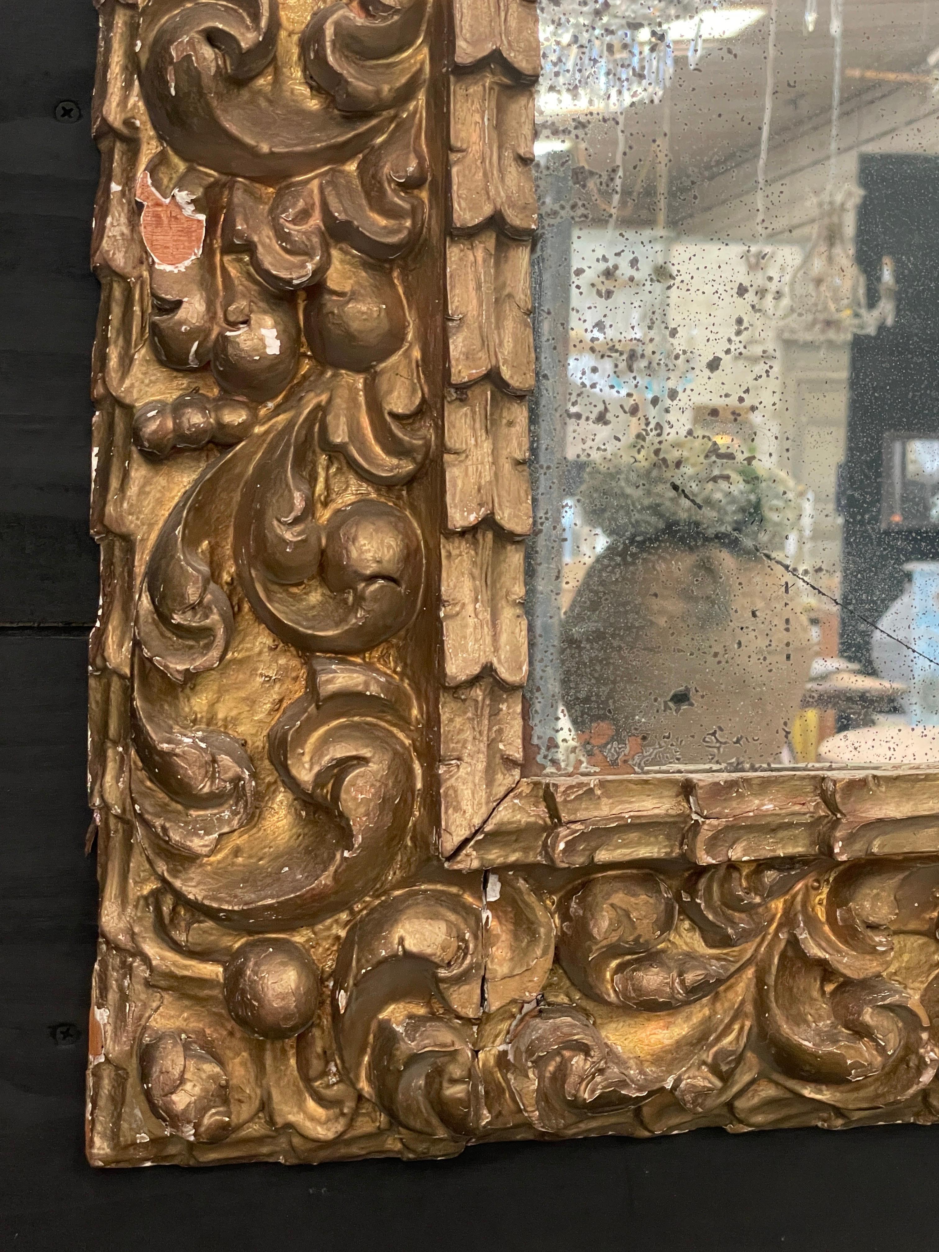 Hand-Carved Italian 18th Century Carved Gilt Mirror Frame With 19th Century Glass For Sale