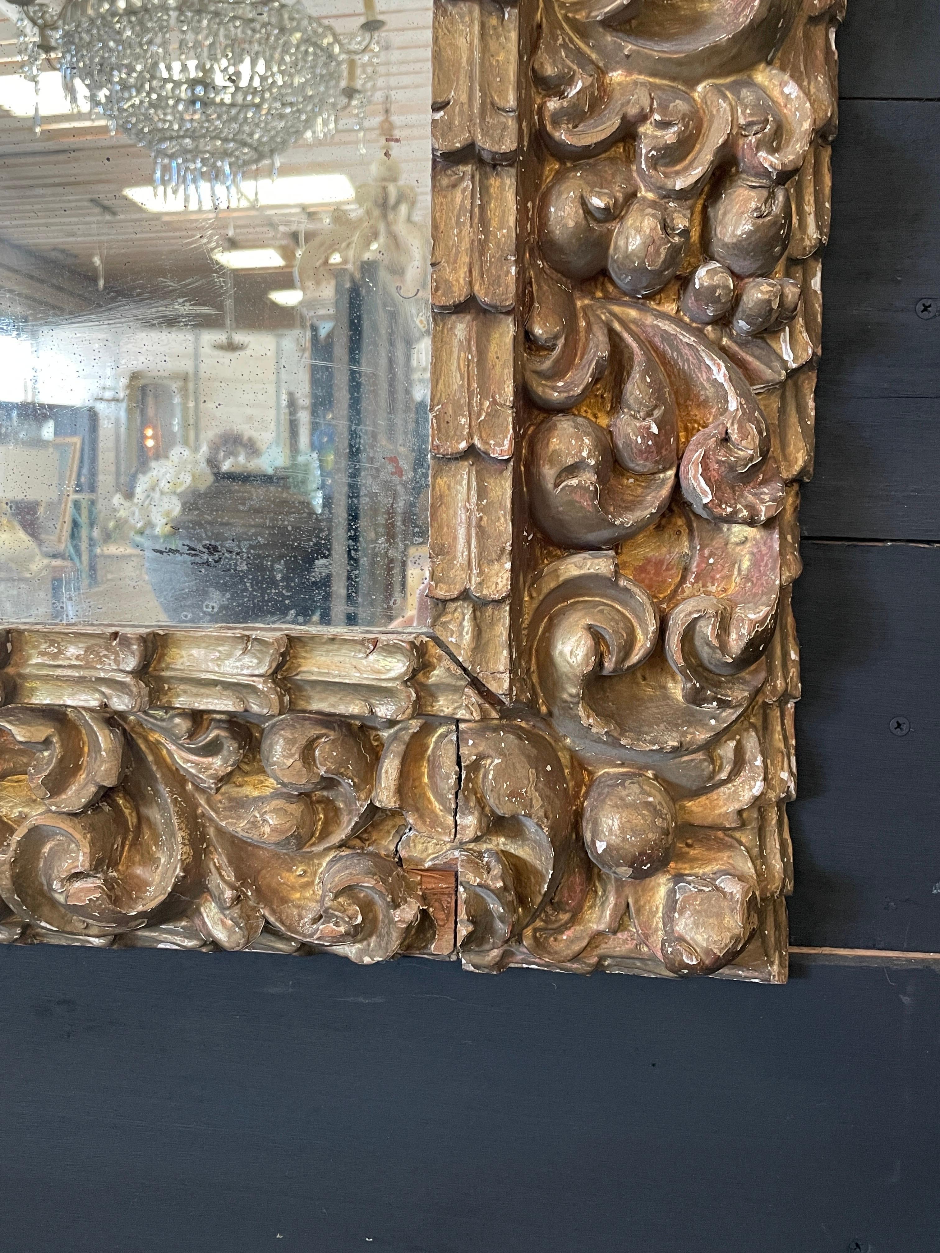 Italian 18th Century Carved Gilt Mirror Frame With 19th Century Glass In Good Condition For Sale In Houston, TX