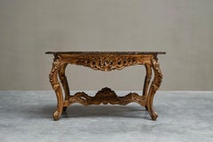 Italian 18th Century Carved Giltwood Center Table with Marble Serpentine Top