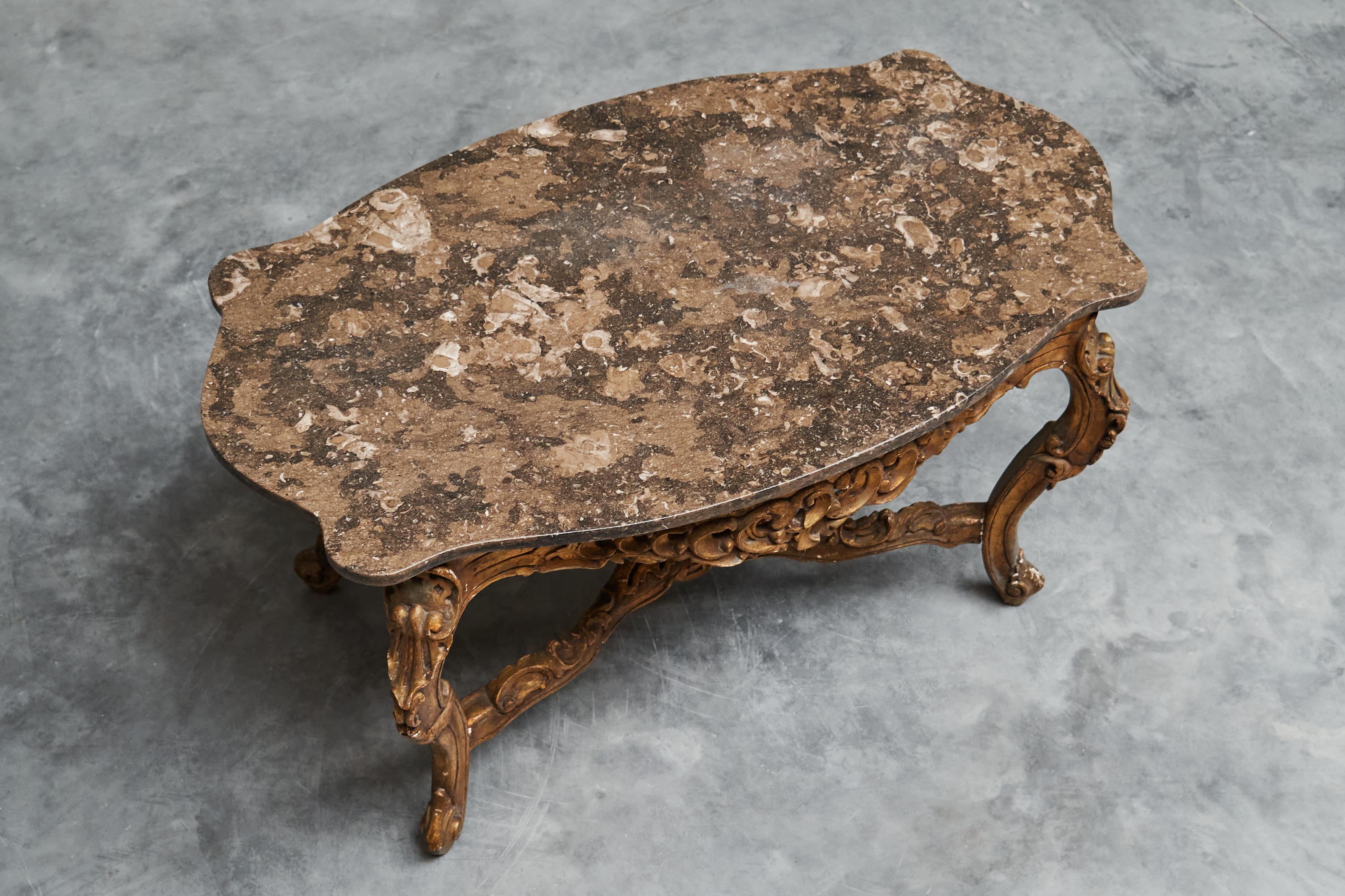 Rococo Italian 18th Century Carved Giltwood Center Table with Marble Serpentine Top For Sale