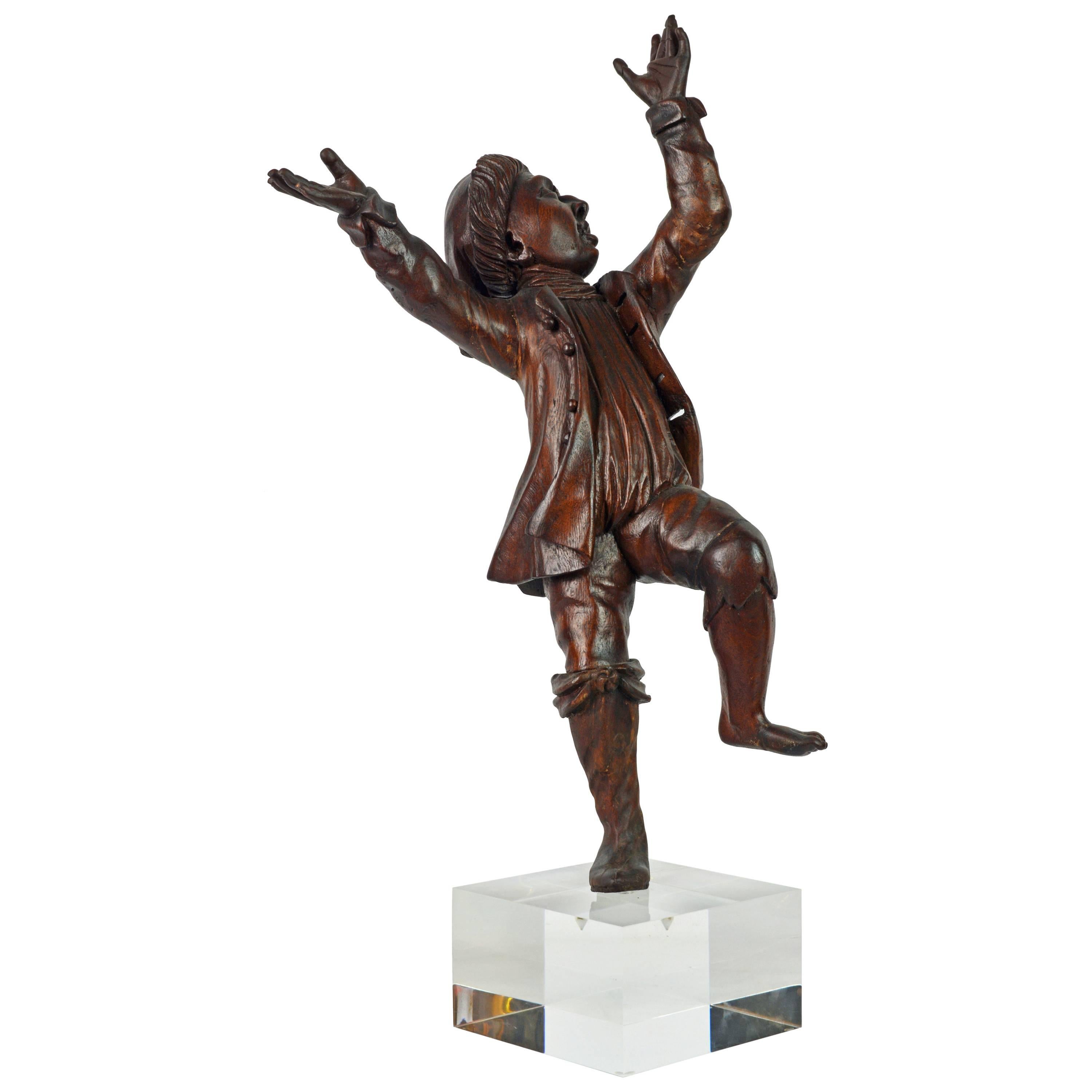 Italian 18th Century Carved Statue of a Dancing Jubilant Boy on a Lucite Base