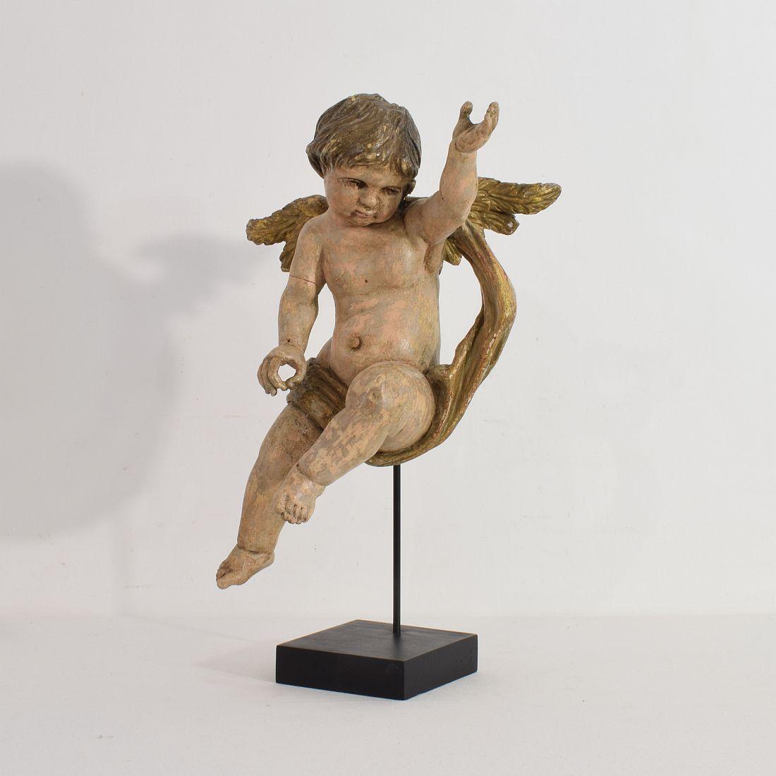 Beautiful Baroque angel. Unique period piece.
Italy, circa 1750
Weathered. Small losses and old repairs.
More pictures on request.
Measurement here below includes the wooden base.

 