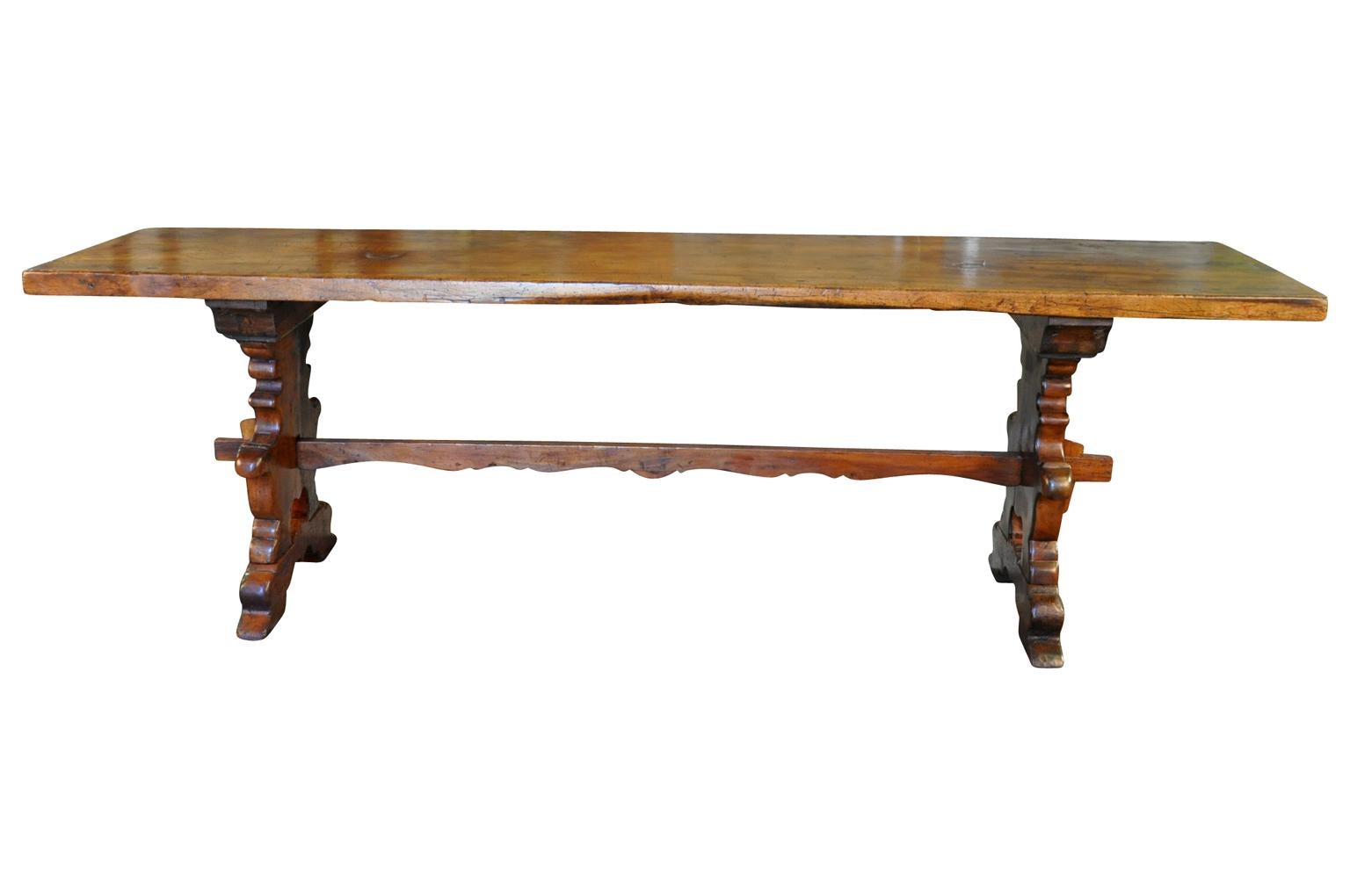 A stunning 18th century console table from Northern Italy. Wonderfully constructed from walnut with beautifully shaped legs and stretcher. The top plank is a solid board of walnut. Exceptional patina.