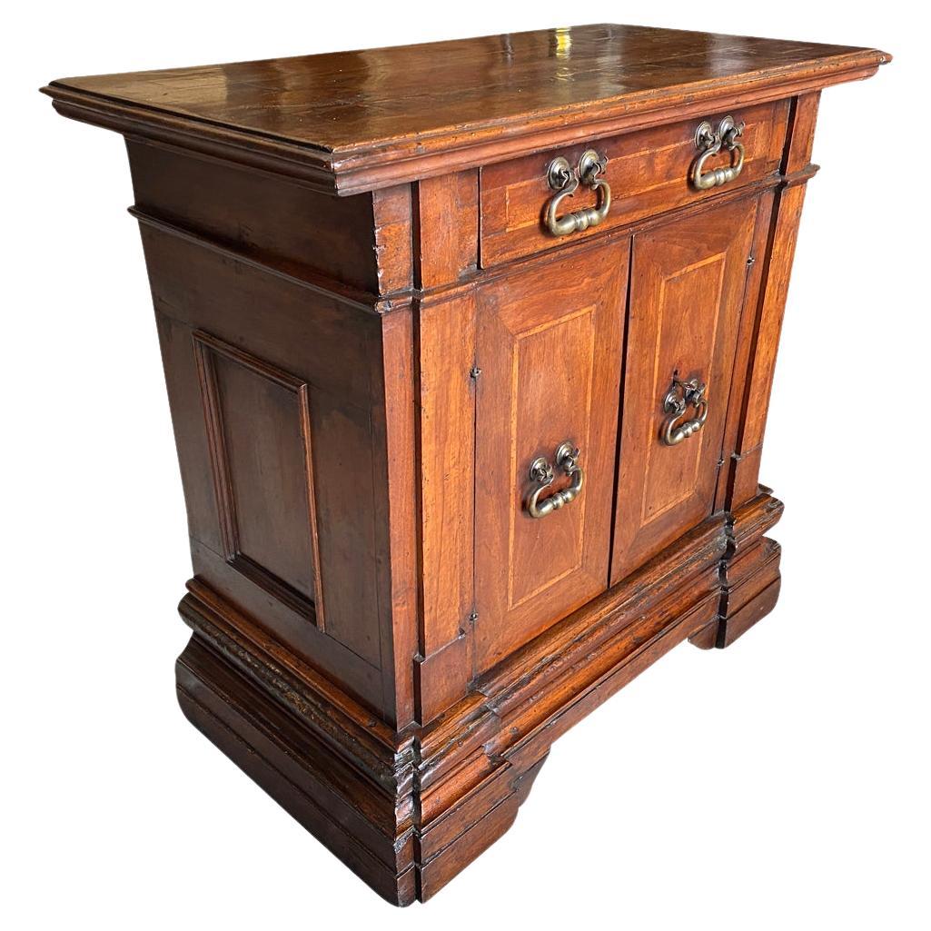A very handsome 18th century Credenzino from Bologna, Italy.  Wonderfully constructed from very handsome walnut with with a molded edge top above a conforming case housing a single drawer.  The lower case has 2 doors opening to reveal interior