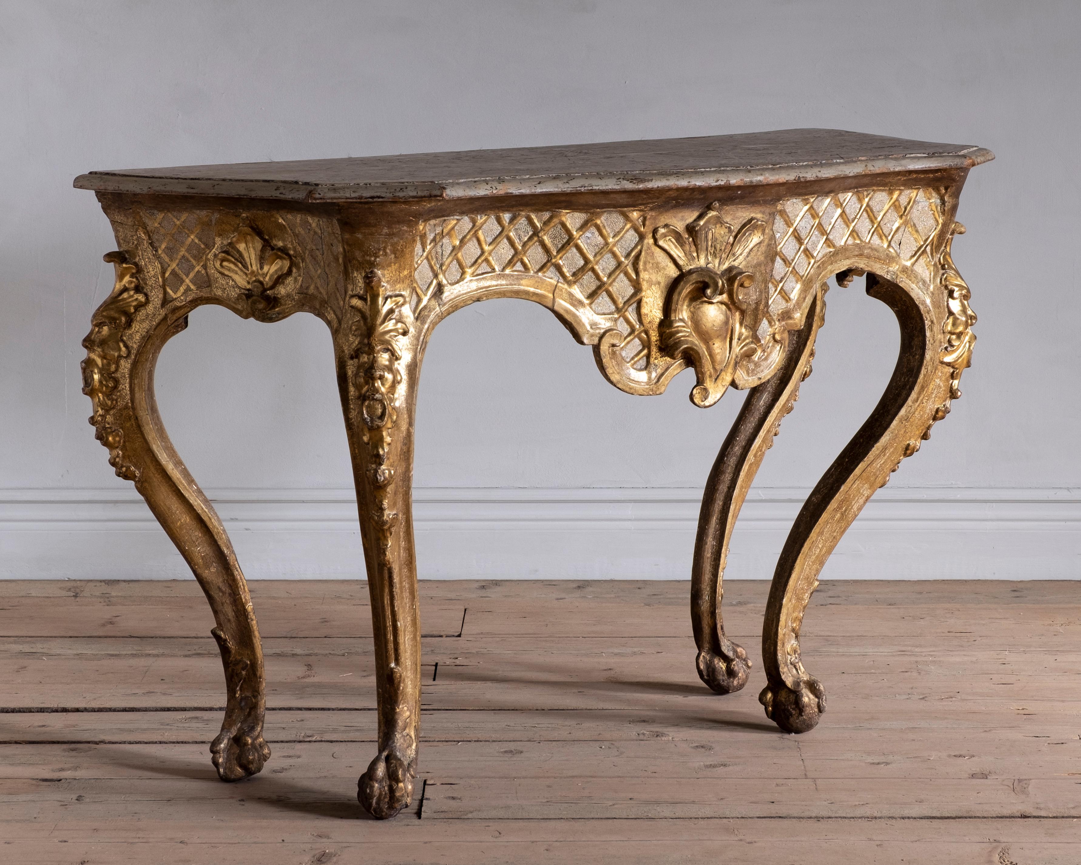 Fine 18th century Italian giltwood console table with a wooden top. Good condition with wear consistent with age and use. A detailed condition report is available on request.