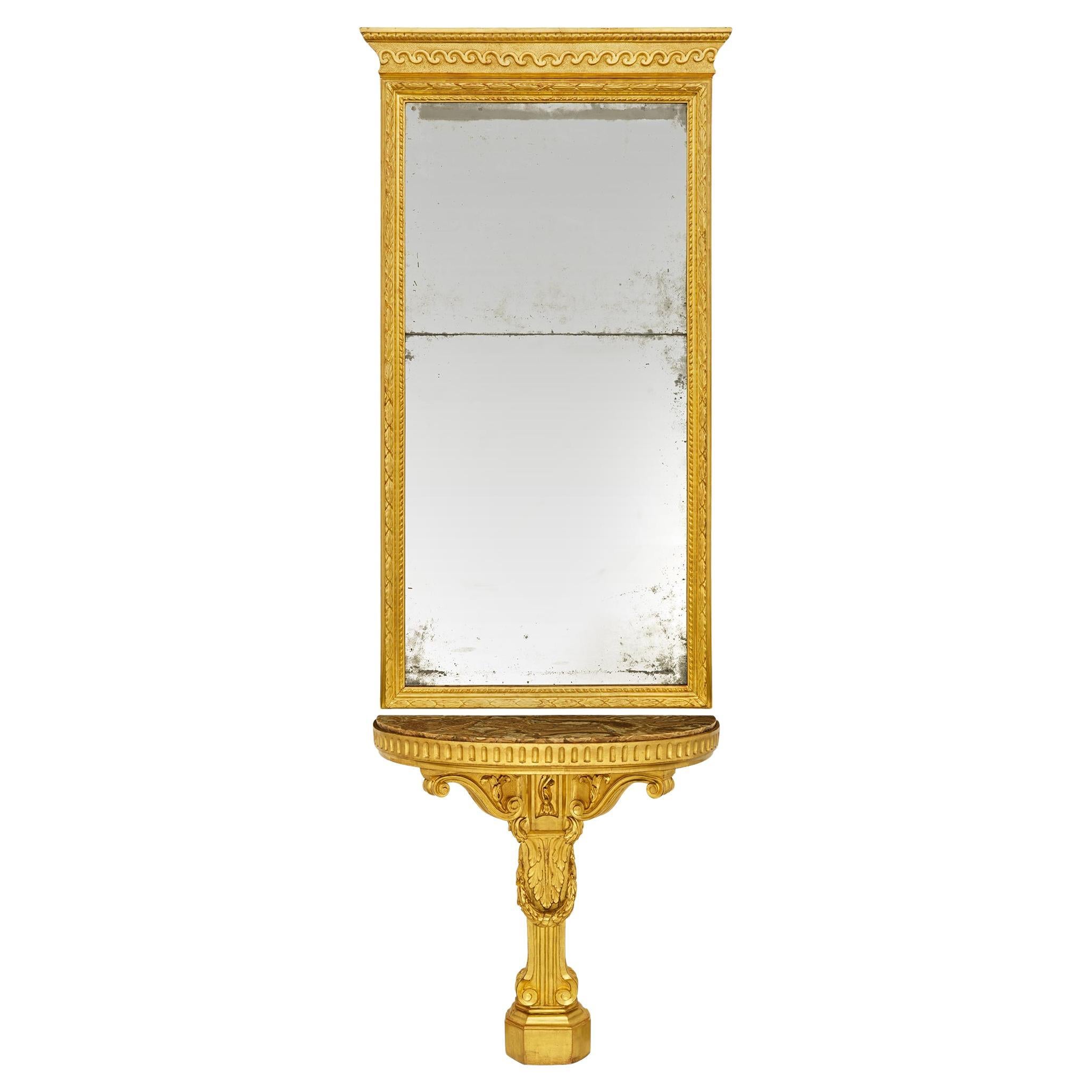Consolle in legno dorato, specchio e marmo del XVIII secolo e specchio abbinato.