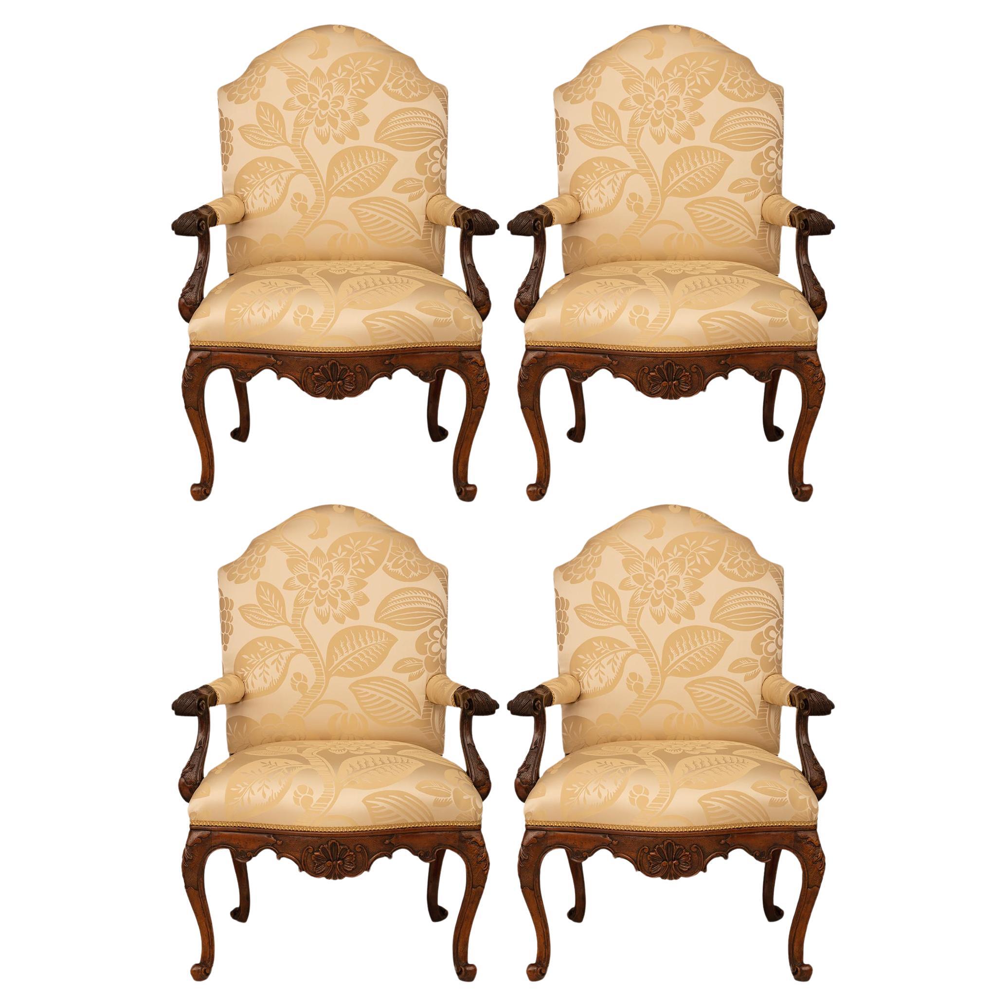 Set of four Italian 18th century Louis XV st. Walnut armchairs.