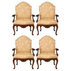 Set of four Italian 18th century Louis XV st. Walnut armchairs.