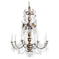 Lampadario italiano del XVIII secolo in legno massiccio dorato e cristallo