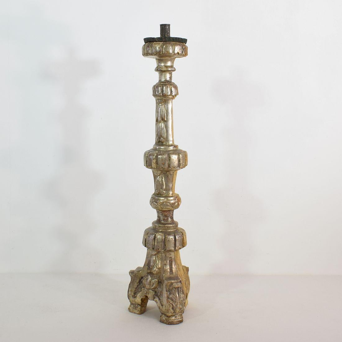 Beautiful candleholder with its original silver,
Italy, circa 1770-1800.
Weathered and small losses.