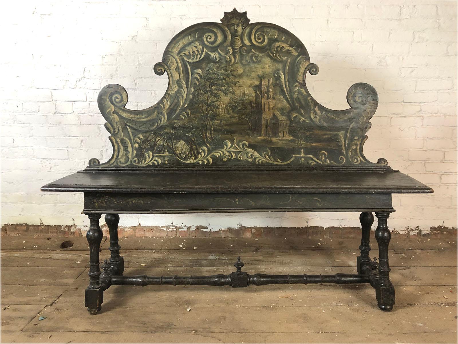 Very decorative painted bench with a serpentine shaped high back, decorated with a scenic landscape and framed by leafy scrolls, foliate seat rail and remains of polychrome on the seat, turned, splayed legs connected by a conforming stretcher,