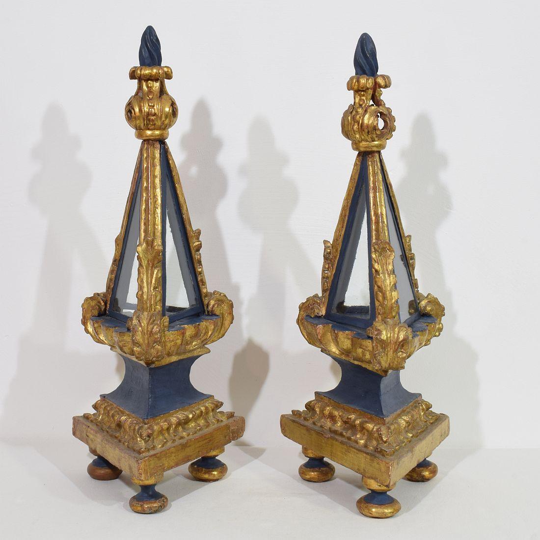 Very rare hand pair carved wooden reliquary shrines with wonderful decoration and color/gilding, 
Italy, circa 1750
Weathered, small losses and old repairs. ( to my opinion glass once replaced)
H:63/64cm  W:25,5cm D:22cm 
Measurement