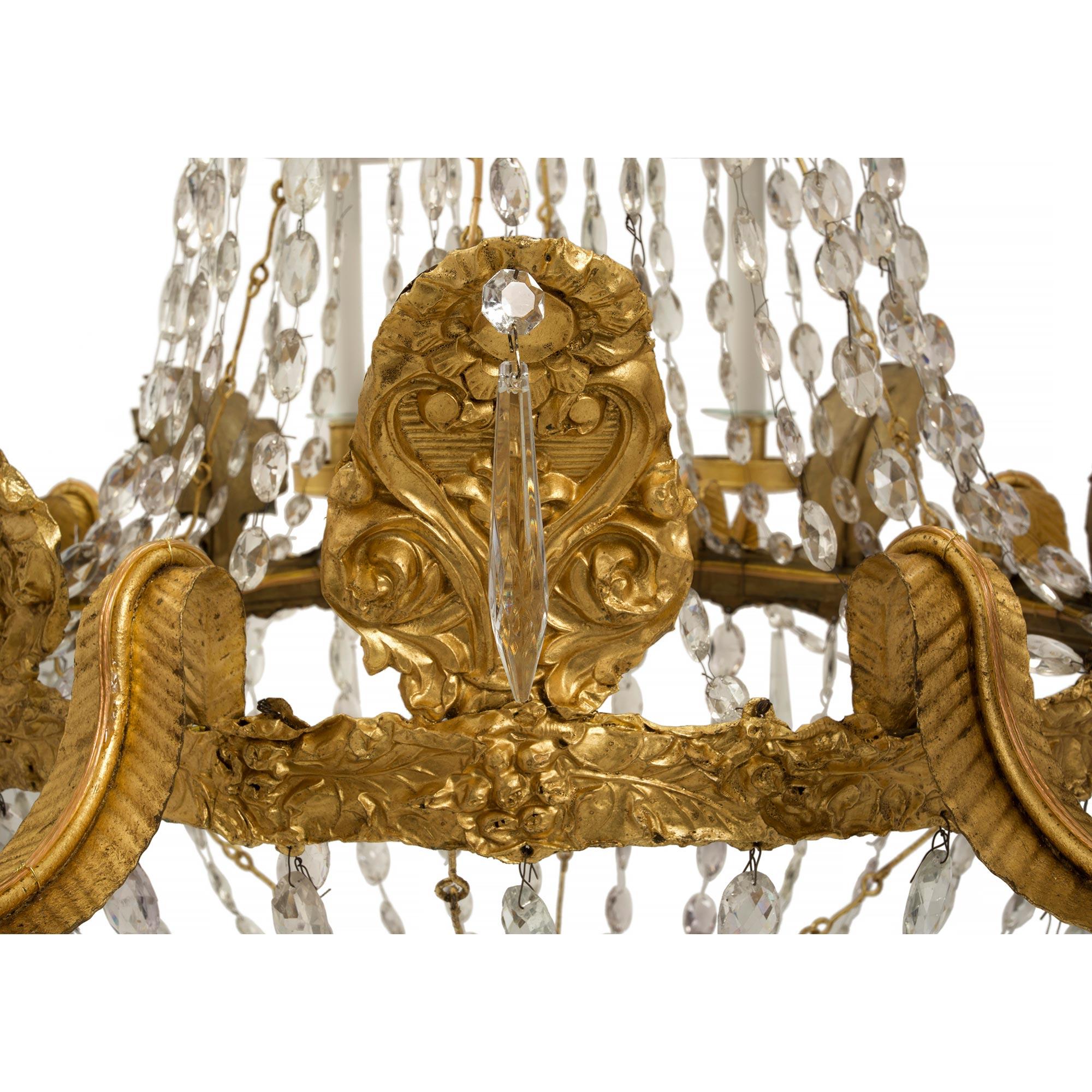 18th Century and Earlier Italian 18th Century Pressed Gilt Metal and Crystal Eight-Light Chandelier For Sale