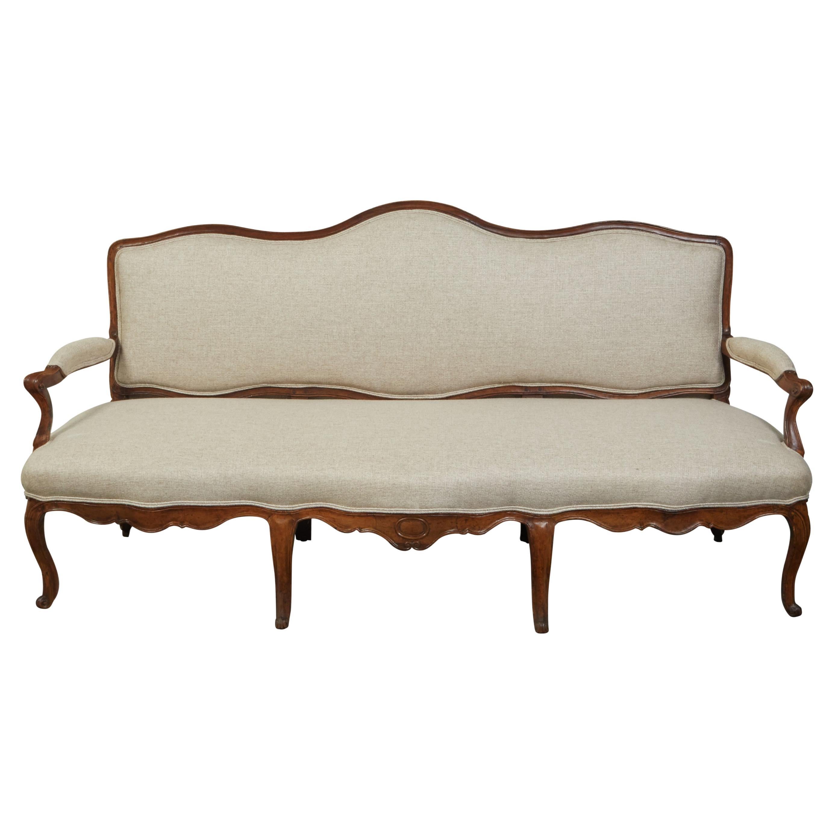 Italian 18th Century Rococo Walnut Sofa with Cabriole Legs and New Upholstery