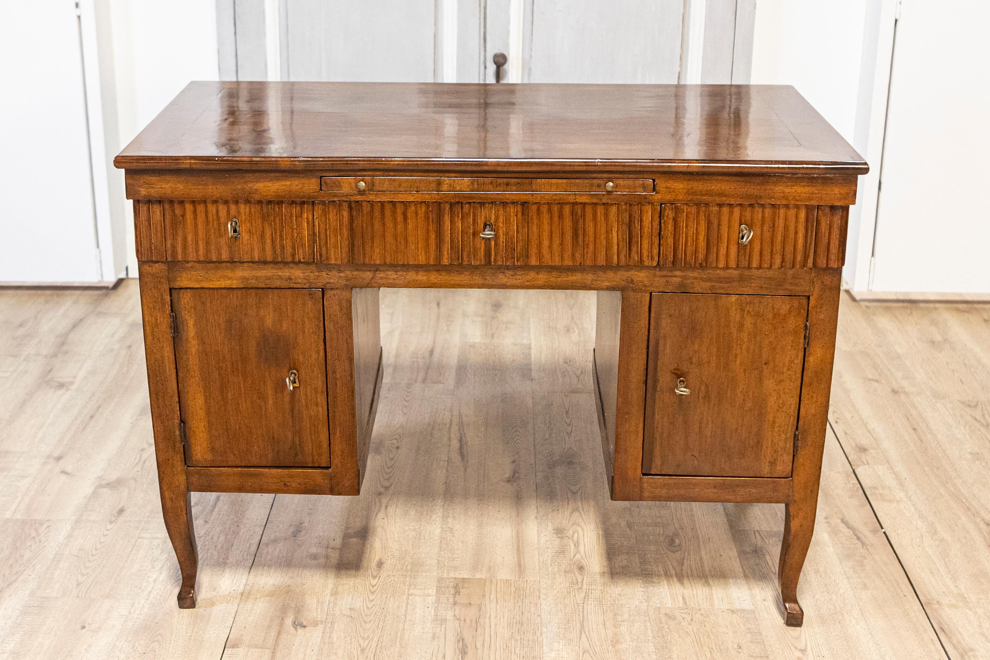 Italian 18th Century Walnut Desk with Carved Reeded Apron, Drawers and Doors In Good Condition For Sale In Atlanta, GA