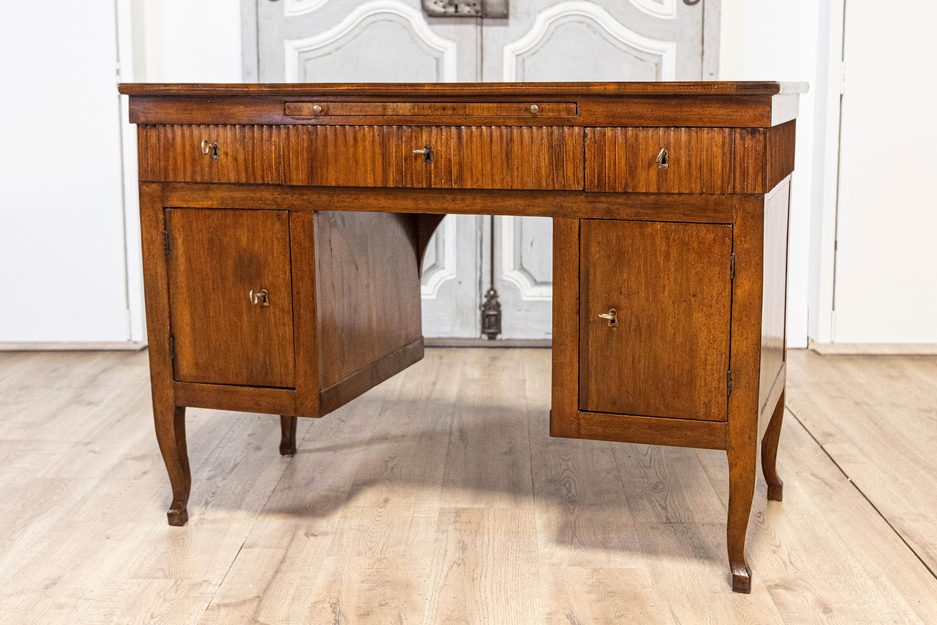 Leather Italian 18th Century Walnut Desk with Carved Reeded Apron, Drawers and Doors For Sale
