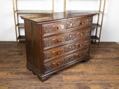 Italian 18th Century Walnut Four-Drawer Commode with Carved Scrolls and Grapes