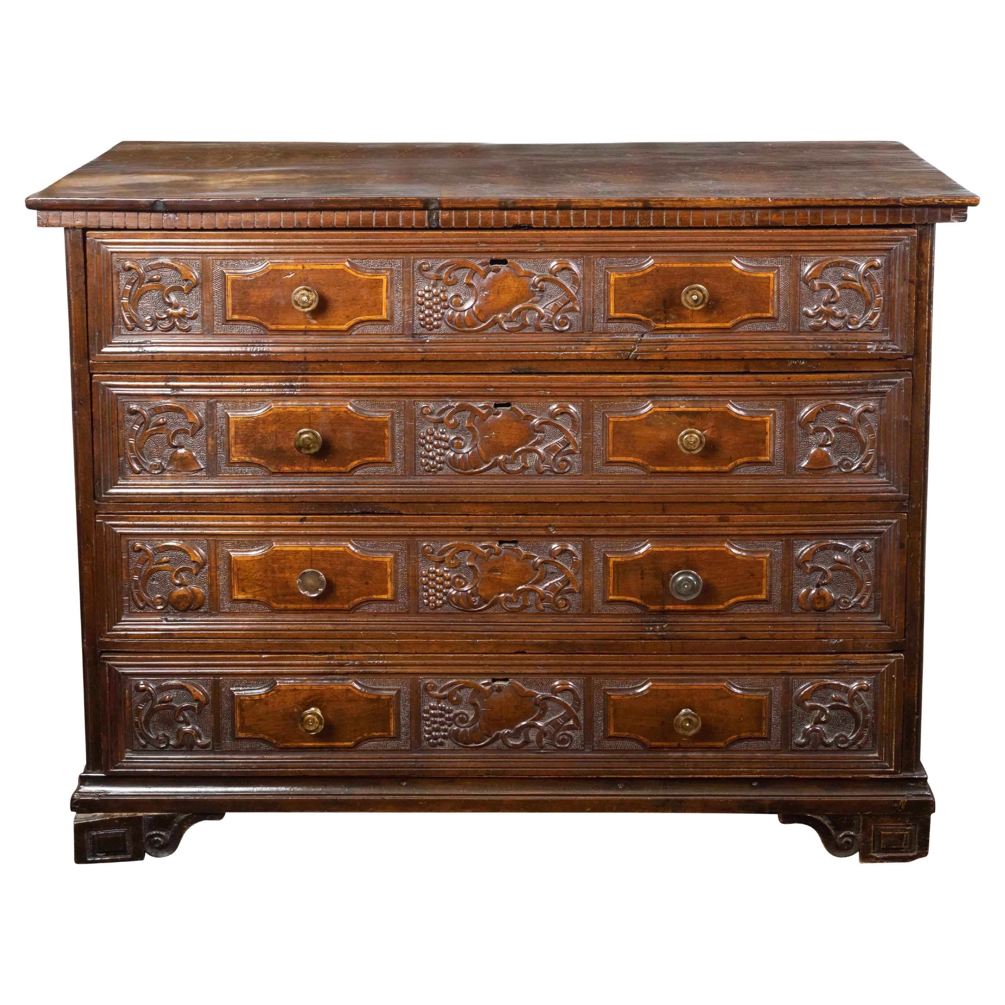 Italian 18th Century Walnut Four-Drawer Commode with Carved Scrolls and Grapes For Sale