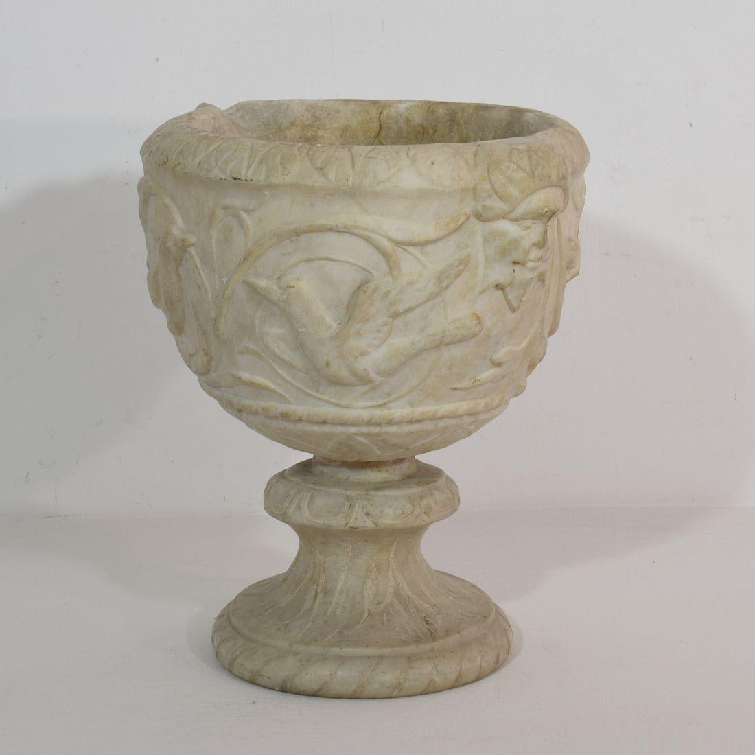 Rare white marble garden urn/ vase. Beautiful decorated with heads and birds,
Italy, circa 1750-1800.
Weathered/ small losses.
More pictures available on request.










 