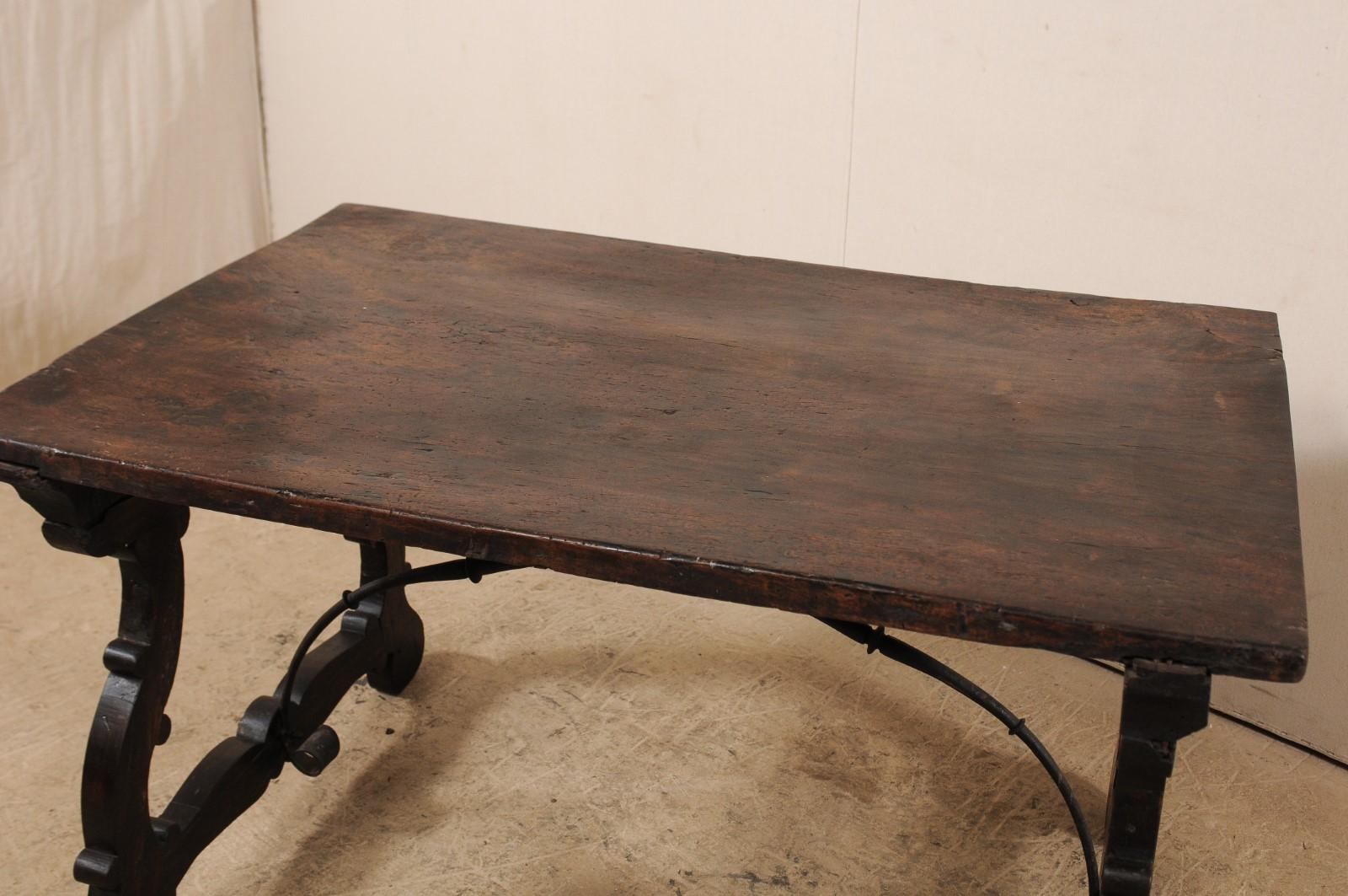 An 18th Century Walnut Wood Trestle Table with Arched Iron Stretcher from Italy 5