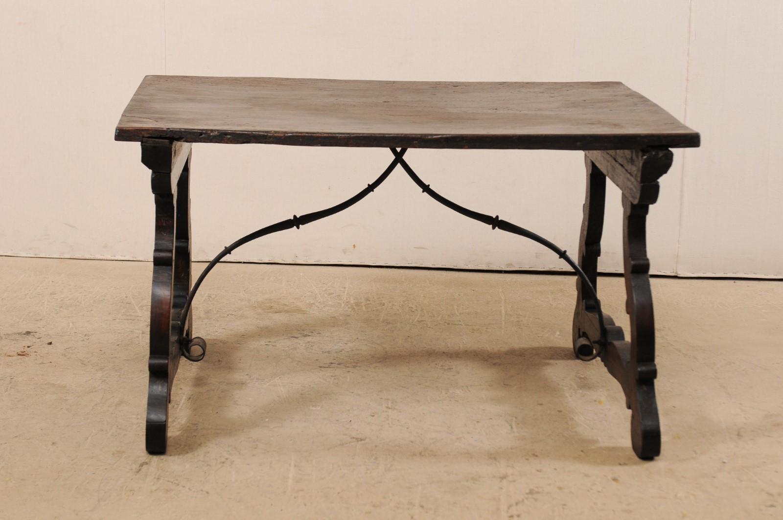 Italian An 18th Century Walnut Wood Trestle Table with Arched Iron Stretcher from Italy